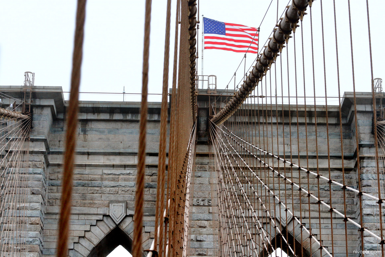 USA flag in the top of the Brooklyn Bridge