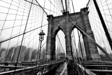 Brooklyn Bridge tower in a foggy day