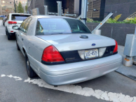 back of a NYPD Ford Crown Victoria Police Interceptor (CVPI)