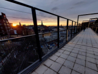 Stockholm skyline at sunset from Katarina gångbro