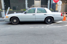 left side of a NYPD Ford Crown Victoria Police Interceptor (CVPI)