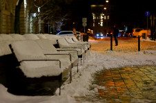 Snow covered bench